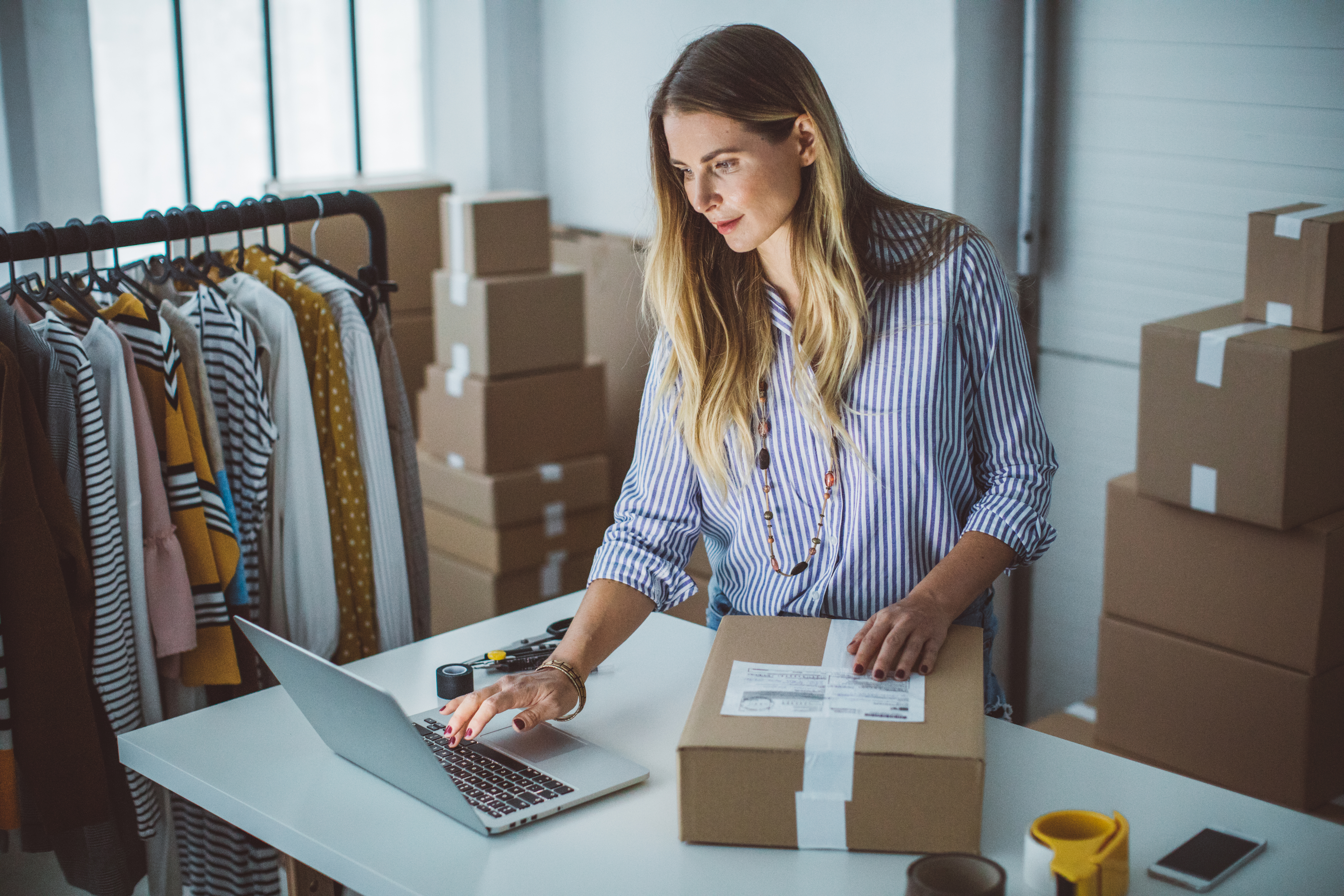 business-owner-managing-shipments-digital-logistics-platform